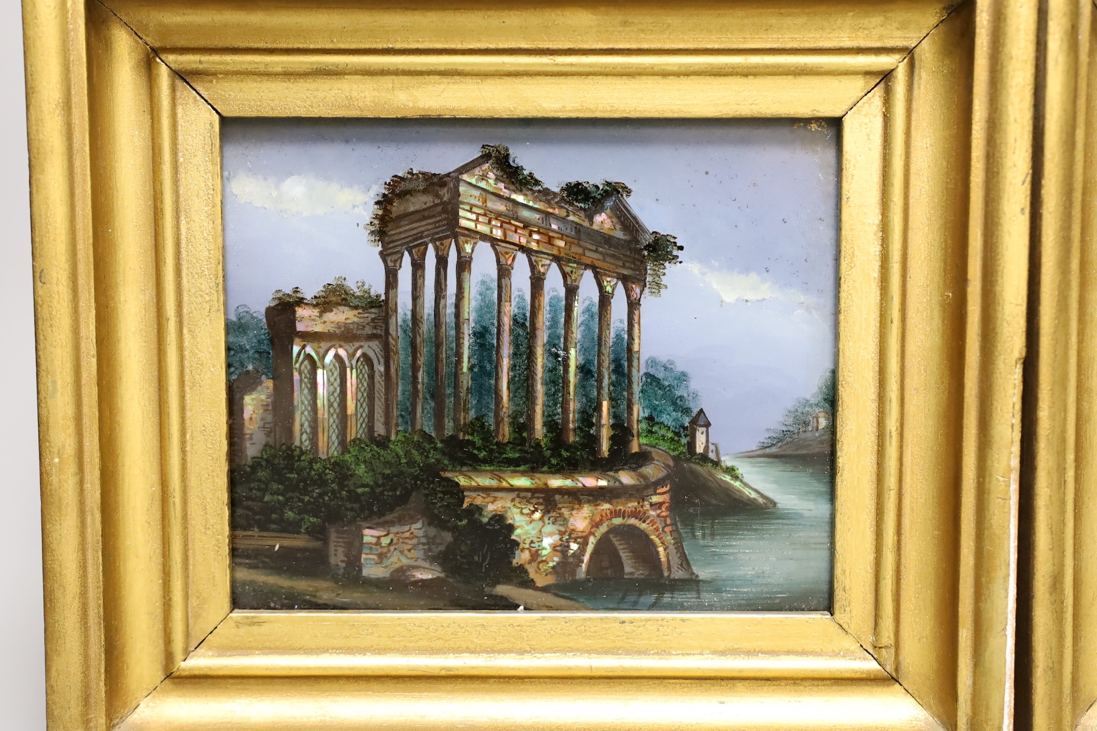 A pair of framed late 19th century reverse glass paintings of Italianate views, 22x25 including frame